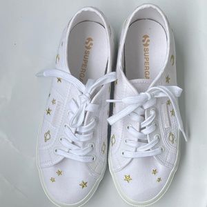 Women’s size 6.5 white sneakers with stars
